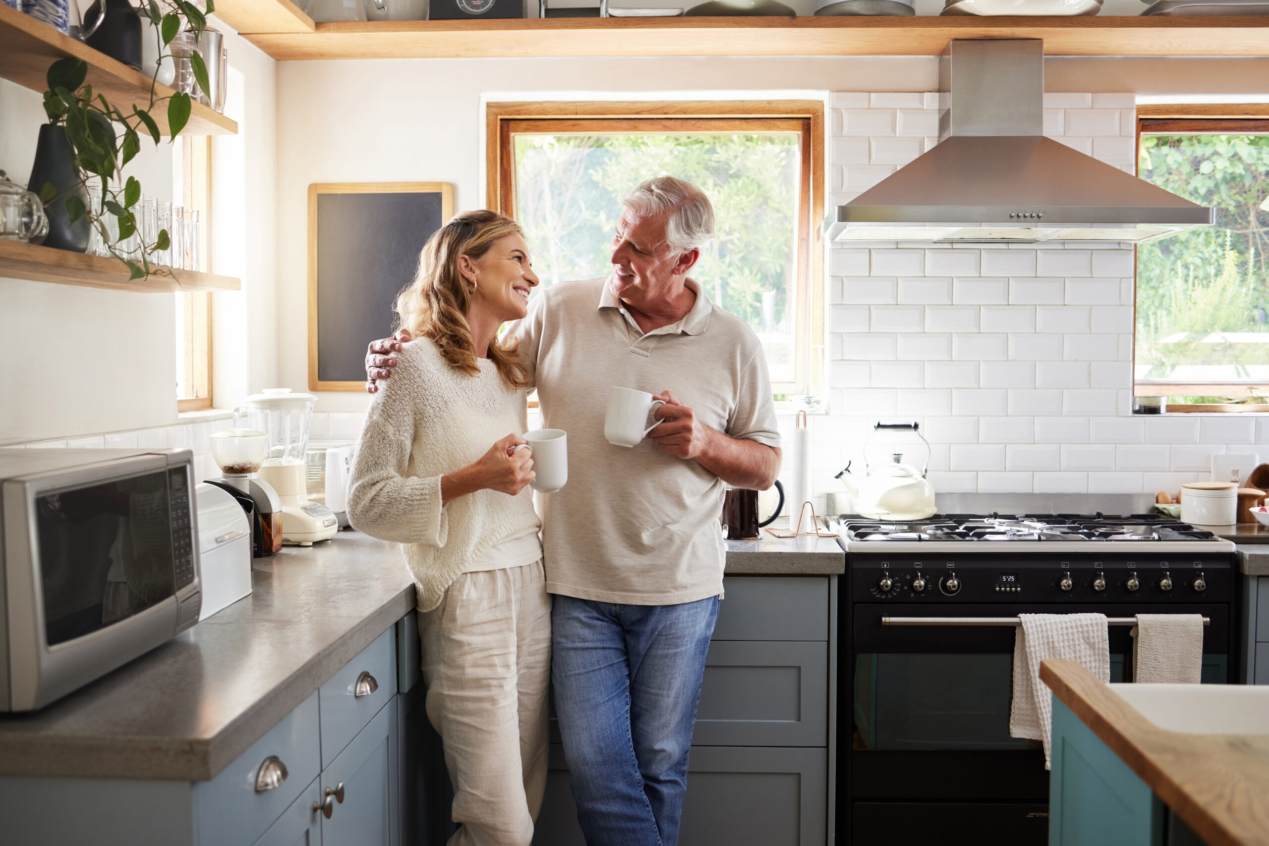 Older couple in kitchen together